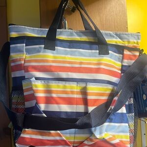 Thirty-One Crossbody Organizing Tote in a multi-colored stripe pattern  NEW